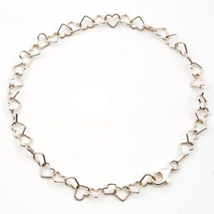 A Silver Bracelet With Heart Shaped Chain