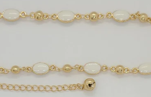 A Gold Color Oval Shape Stone Bracelet